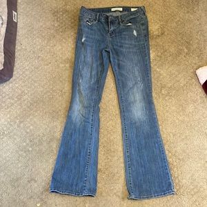 Two pair Bull head boot, cut, lightly distressed jeans.